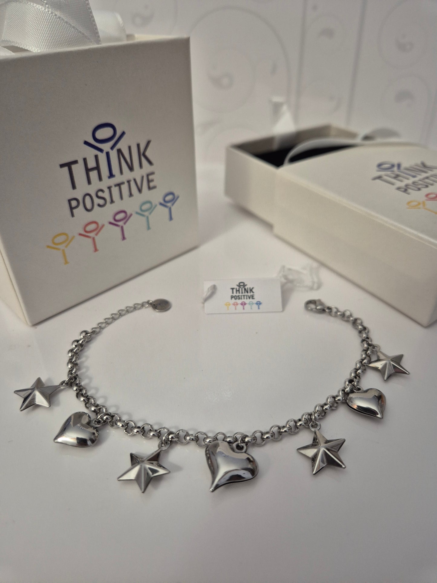 Bracciale Think Positive cuori e stelle acciaio donna