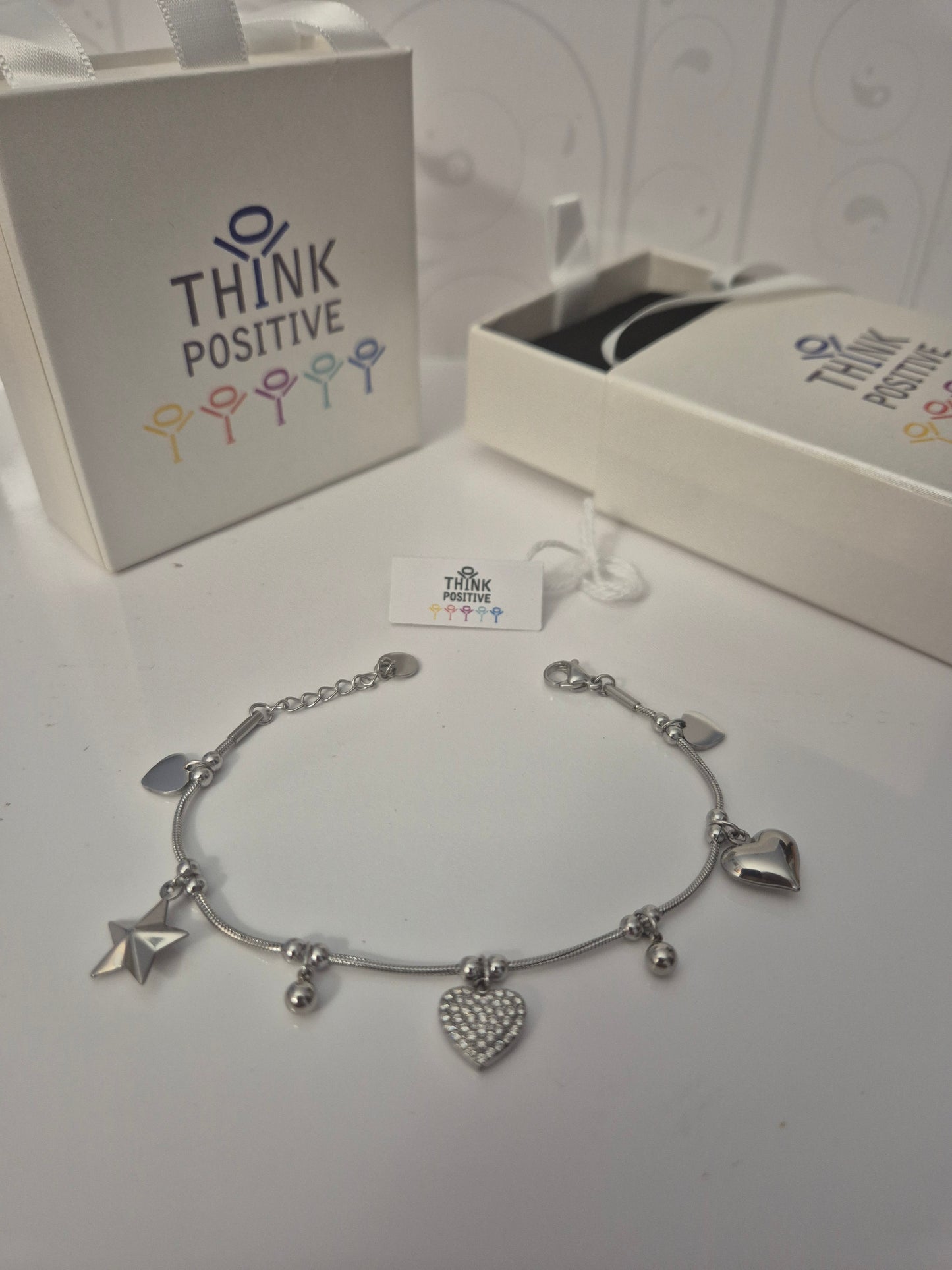 Bracciale Think Positive cuori e stelle semirigido acciaio