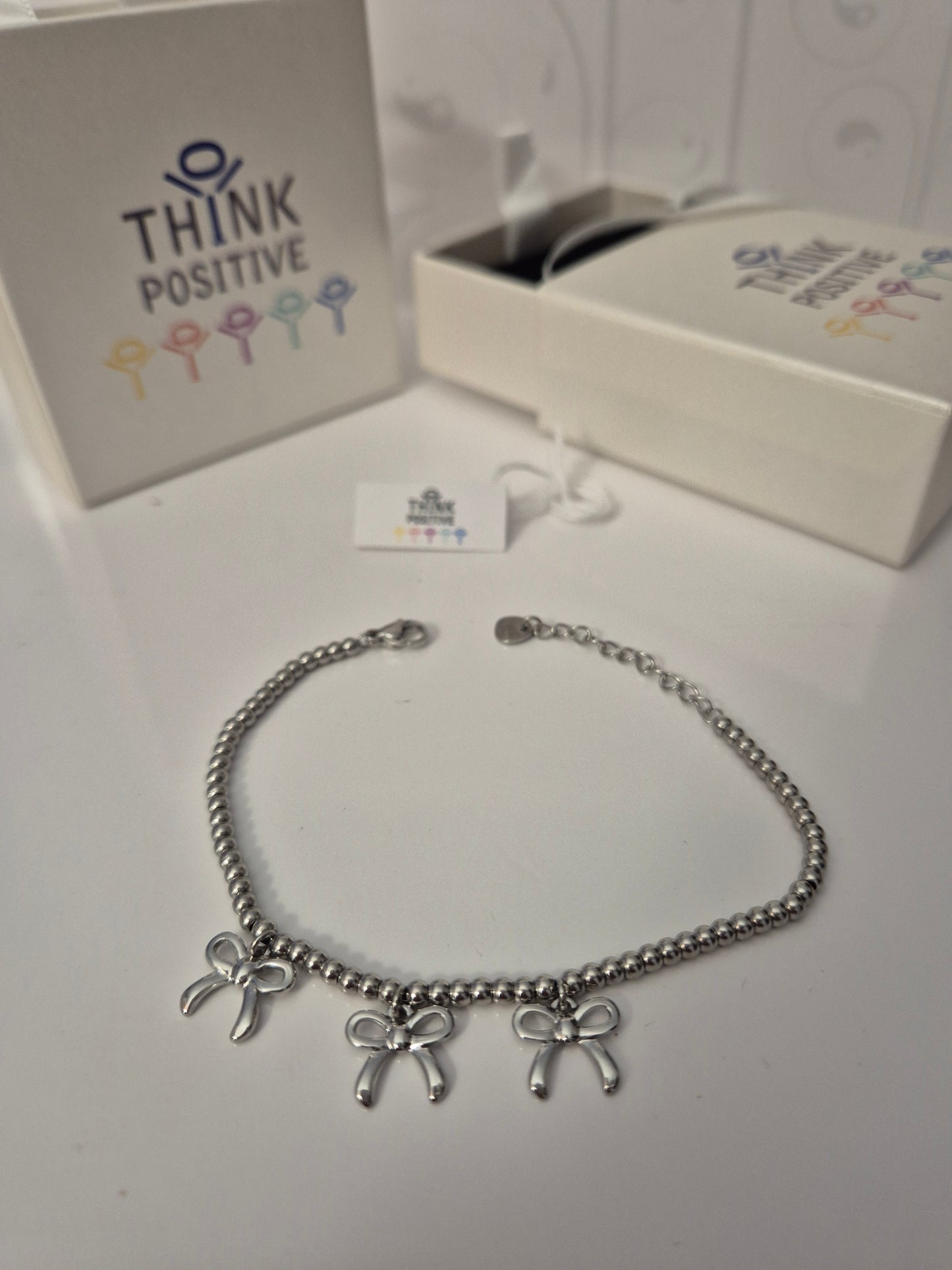 Bracciale Think Positive fiocchi con palline acciaio